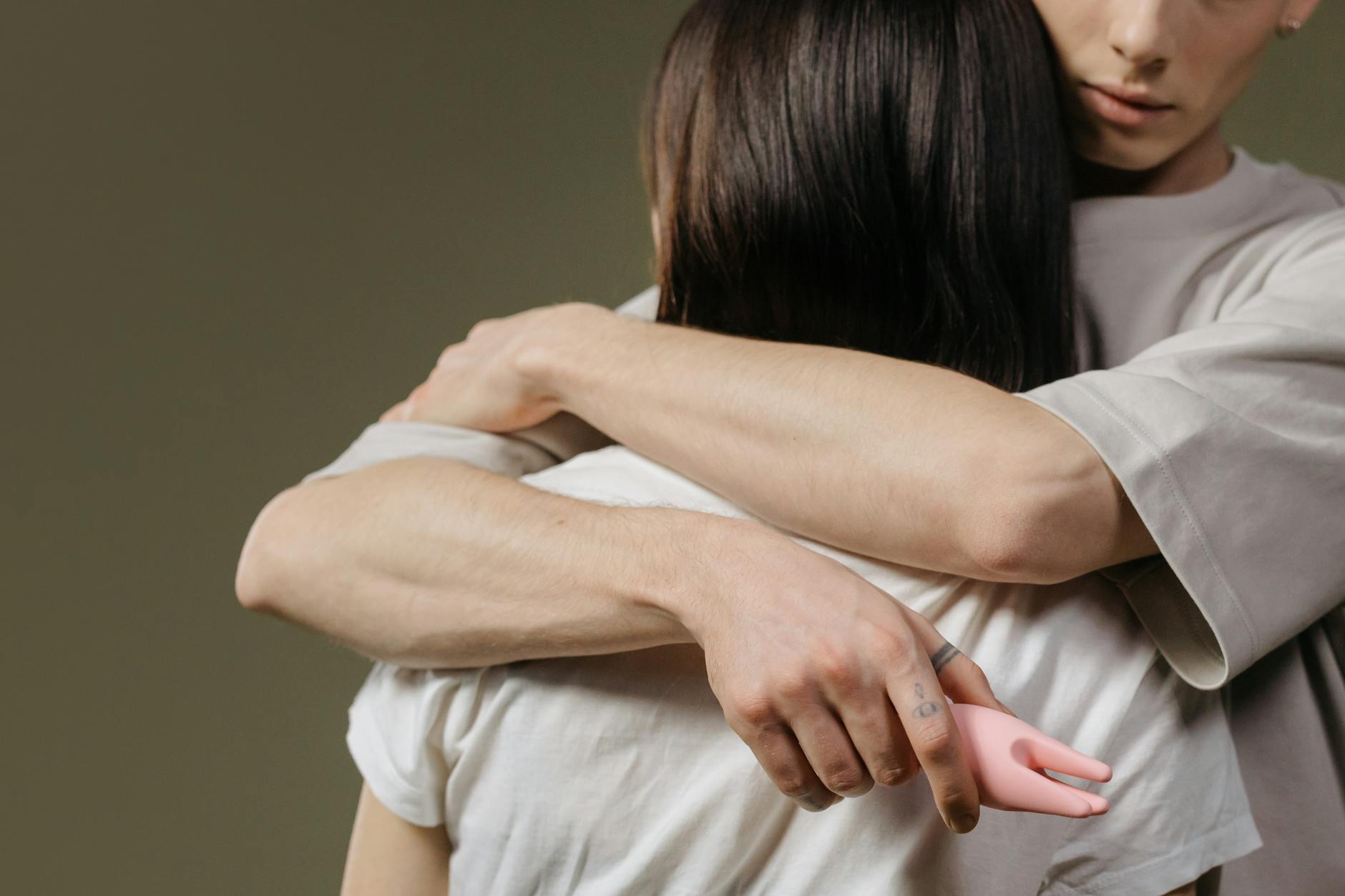 A couple embracing intimately indoors, reconnecting after emotional distance